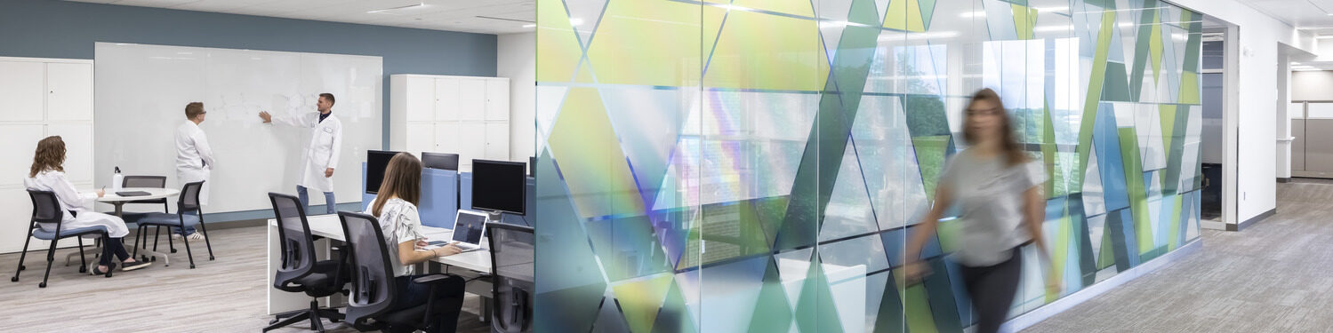 People working in a remodeled collaboration space in the Lifecore offices.