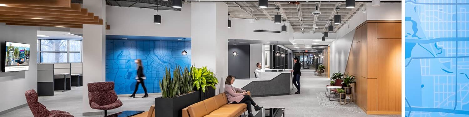 A large open lobby and reception area, with comfortable seating for guests.